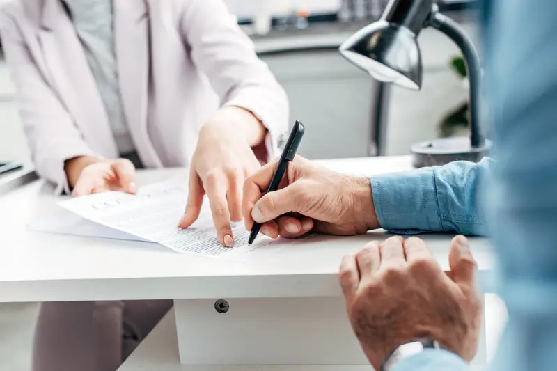 business people signing contract