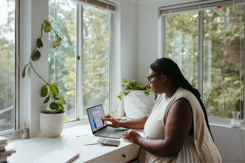 Woman with a long hair working remotely