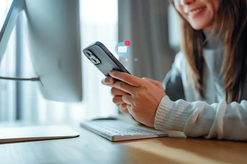 Woman hands using smartphone with 1 new email alert sign icon pop up, Female using phone for check email for work or sending text SMS short message at home, Online communication concept