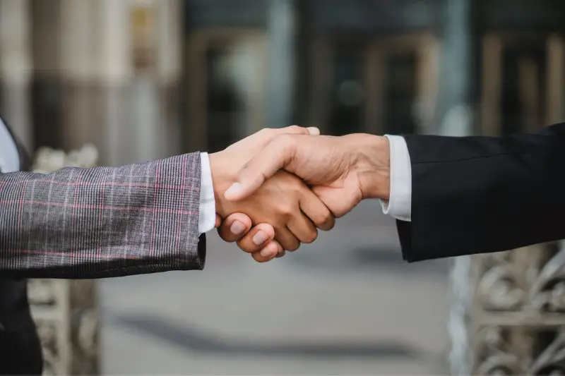 Business people shaking hands