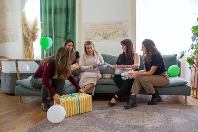 Group of People Sitting on Couch