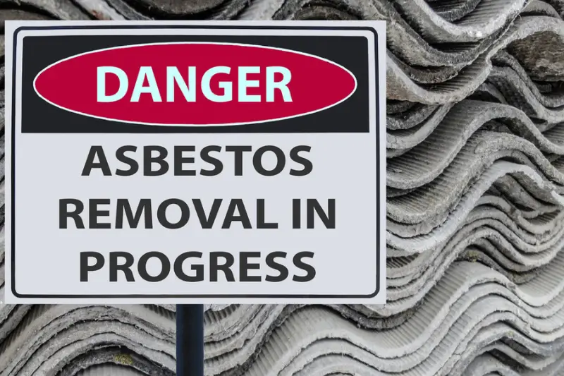 Sign danger asbestos removal in progress