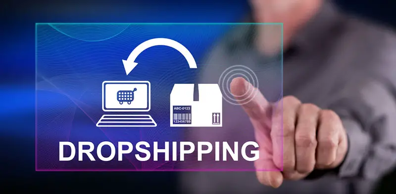 Man touching a dropshipping concept on a touch screen