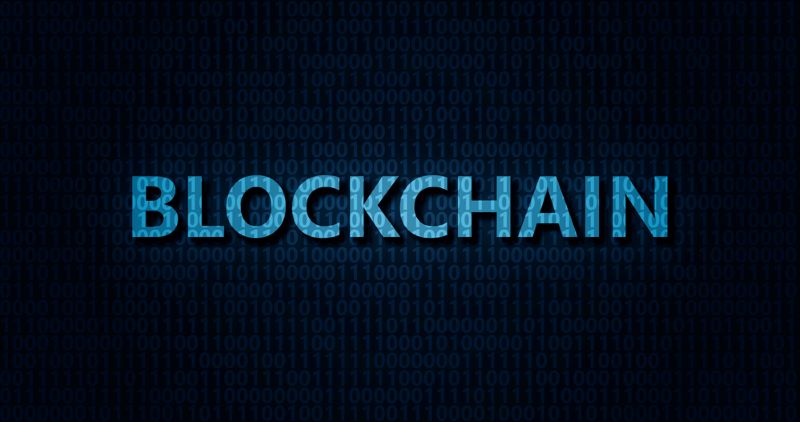 Blockchain word on digital background with binary code