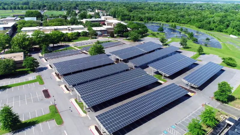 Aerial view of solar panels installed in roof of parking