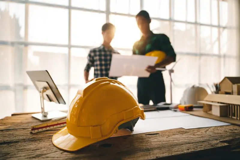 Businessmen working as a team discussing information and plans for architecture Engineer